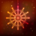 Snowflake sparkles on a dark red background,