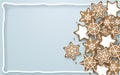 Snowflake, star, cookies shapes on soft blue background