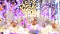 Snowflake symbols and stars and hanging balls. Beautiful bokeh as a background during Christmas Royalty Free Stock Photo