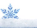 Snowflake in white snow. Isolated. Royalty Free Stock Photo