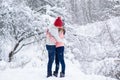 Snowflakes around woman and man in love