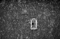 Snowflakes on a barn with a window