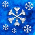 Snowflakes on blue geometric background with triangular po Royalty Free Stock Photo