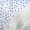 Snowflakes on a blurry colored background.