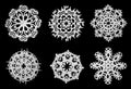 Snowflakes cut out of paper on a black background Royalty Free Stock Photo