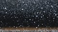 Snowflakes Falling in the Air with Bokeh Effect and Dark Background Royalty Free Stock Photo