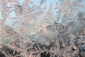 Snowflakes frost rime macro on window glass pane