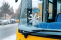 Snowflakes on a Frosted Tram Window in Golden Light. Royalty Free Stock Photo