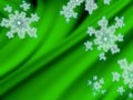 Snowflakes on green velvet background