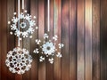 Snowflakes hanging over wooden. EPS 10