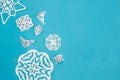 New year`s blue background with white paper snowflakes, copy space . Christmas Wallpaper with snowflakes Royalty Free Stock Photo