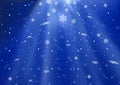 Snowflakes in Rays of Light Royalty Free Stock Photo