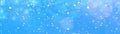 Snowflakes, snow, stars and ice crystals isolated on blue sky - Abstract winter christmas background panorama banner long Royalty Free Stock Photo