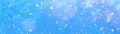 Snowflakes, snow, stars and ice crystals isolated on blue sky - Abstract winter christmas background panorama banner long Royalty Free Stock Photo