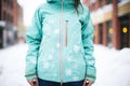 snowflakes on snowshoers jackets