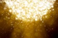 Snowflakes and stars descending , golden light Royalty Free Stock Photo