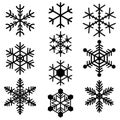 Snowflakes symbols icons signs logos simple black colored set Royalty Free Stock Photo