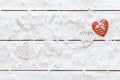 White red hearts and snowflakes on wooden table, romantic love card, Valentines day background, top view, copy space Royalty Free Stock Photo