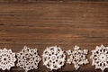 Snowflakes Wood Background, Christmas Lace Snow Flakes, Wooden Royalty Free Stock Photo