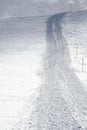 Snowgroomer tracks Royalty Free Stock Photo