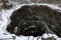 Snowing on Angelo Cave a chasm created by a gas bubble on the lava flow of 1651 in Etna Park