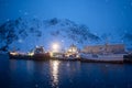 Snowing in Ballstad village at twilight in winter season, city the small harbour of Norwegian, Lofoten islands, Norway Royalty Free Stock Photo