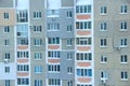Snowing in city with view to modern multi-storey and apartment house Royalty Free Stock Photo