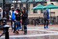 Snowing in downtown Vancouver with people