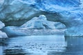 Snowing Floating Blue Iceberg Arch Reflection Paradise Bay Skintorp Cove Antarctica