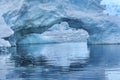 Snowing Floating Blue Iceberg Arch Reflection Paradise Bay Skintorp Cove Antarctica