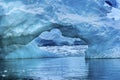 Snowing Floating Blue Iceberg Arch Reflection Paradise Bay Skintorp Cove Antarctica Royalty Free Stock Photo
