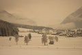 It is snowing on a small town in the high mountains Royalty Free Stock Photo