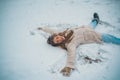 Snowing winter beauty fashion concept. Enjoying nature wintertime. Beautiful girl in snow. Winter mood. Royalty Free Stock Photo