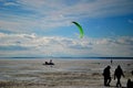 Snowkiter on the frozen Volga River against the backdrop of the blue sky.