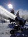 Snowmaking machine in action Royalty Free Stock Photo