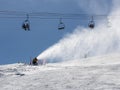 Snowmaking spraying snow Royalty Free Stock Photo