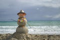 Snowman on beach Royalty Free Stock Photo