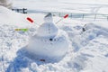 Snowman on mountains