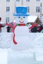 A snowman in a clearing in the forest.Festive Christmas decorations Royalty Free Stock Photo