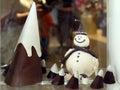 Snowman and a cone of white and dark chocolate