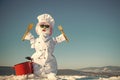 Snowman cook with wooden spoon and fork. Royalty Free Stock Photo