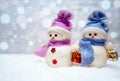 Snowman couple with scarfs