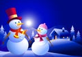 Snowman couple at winter night