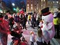 Snowman and Crowd at the Christmas Celebration