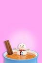 Snowman in a cup of hot chocolate or cocoa, 3d render. Creative cappuccino with marshmallows. Funny Christmas card Royalty Free Stock Photo