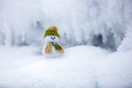 Snowman in green hat. Royalty Free Stock Photo