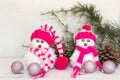snowmen made with wool pompoms, on a Christmas background Royalty Free Stock Photo