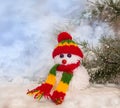 snowmen made with wool pompoms, on a Christmas background Royalty Free Stock Photo