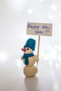 Snowman , happy new year 2016, white background, light garland Royalty Free Stock Photo