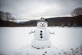 A snowman hat left in the snow Royalty Free Stock Photo